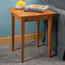 end table with two books stacked on top